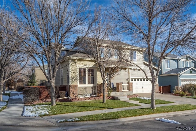 view of front facade featuring a front yard and a garage