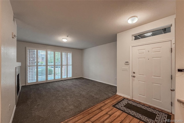804 Summer Hawk Dr Unit 5105, Longmont, CO 80504 - entrance foyer featuring wood finished floors and baseboards
