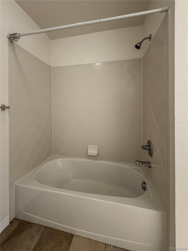 804 Summer Hawk Dr Unit 5105, Longmont, CO 80504 - full bathroom with washtub / shower combination and tile patterned floors
