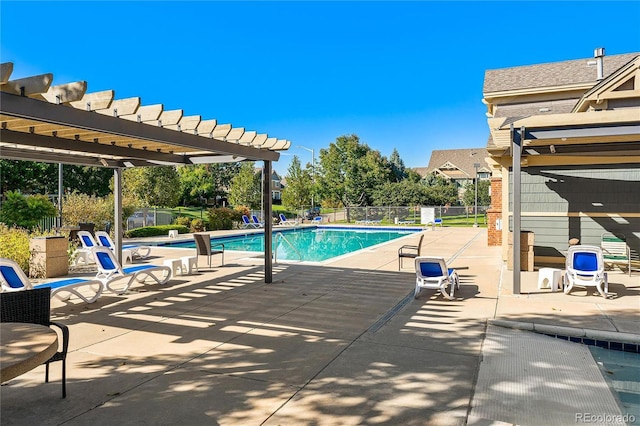 804 Summer Hawk Dr Unit 5105, Longmont, CO 80504 - community pool featuring a pergola and a patio