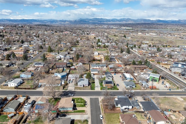 drone / aerial view with a residential view and a mountain view