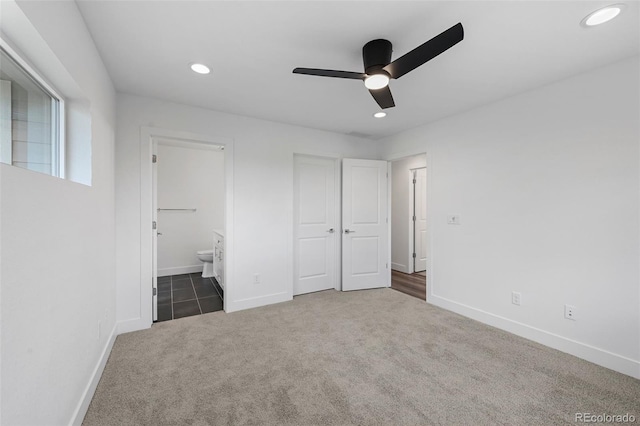 unfurnished bedroom with carpet floors, baseboards, ceiling fan, ensuite bath, and recessed lighting
