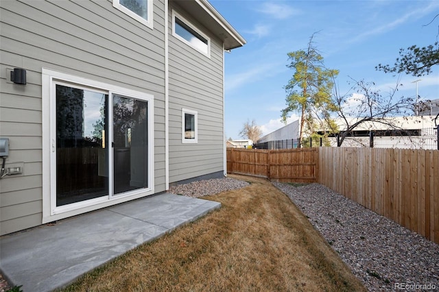 view of yard featuring a fenced backyard and a patio