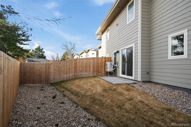 view of yard with a patio area and a fenced backyard