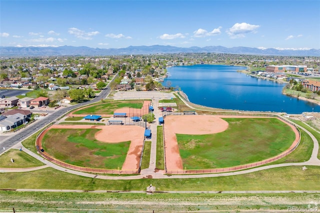 aerial view featuring a residential view and a water and mountain view