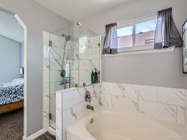 13358 Briarwood Dr, Broomfield, CO 80020 - full bathroom featuring connected bathroom, a stall shower, and a bath