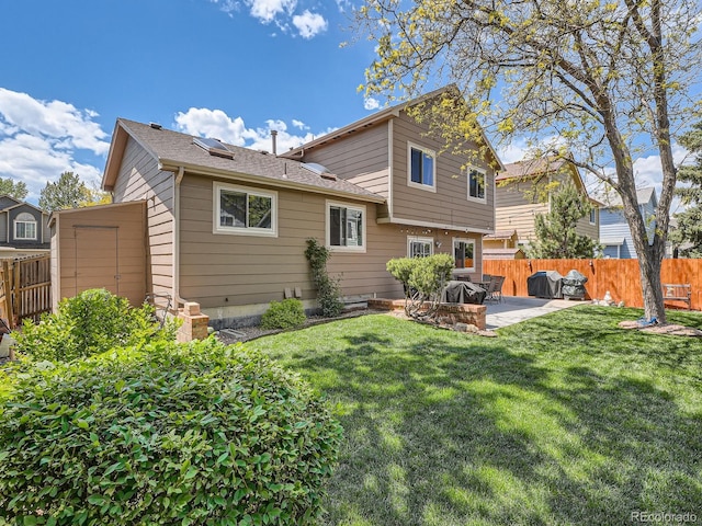 13358 Briarwood Dr, Broomfield, CO 80020 - rear view of house with a patio