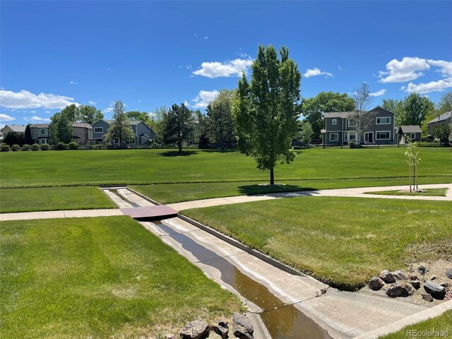 13358 Briarwood Dr, Broomfield, CO 80020 - view of community with a yard