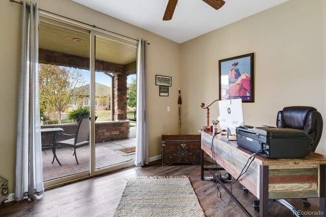 home office with ceiling fan and wood-type flooring