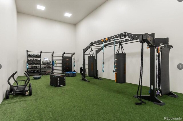 interior space with carpet and gas water heater