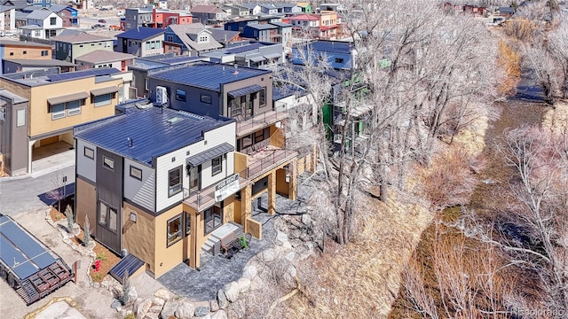 birds eye view of property with a residential view