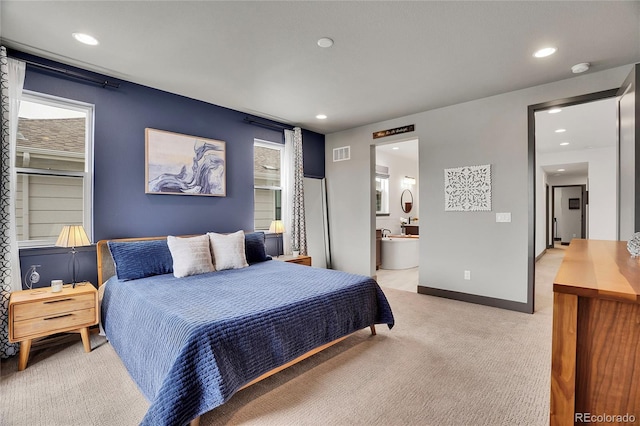 21345 E 59th Dr, Aurora, CO 80019 - bedroom featuring light colored carpet, recessed lighting, and ensuite bathroom