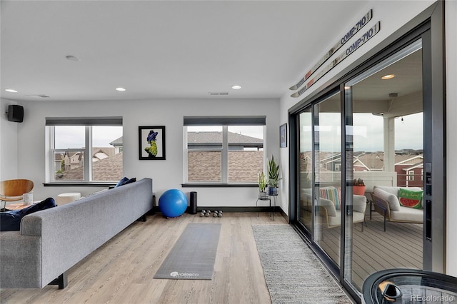 21345 E 59th Dr, Aurora, CO 80019 - workout room featuring wood finished floors and recessed lighting