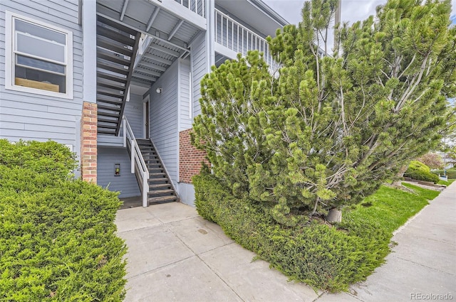 3141 S Tamarac Dr Unit 202E, Denver, CO 80231 - entrance to property with brick siding