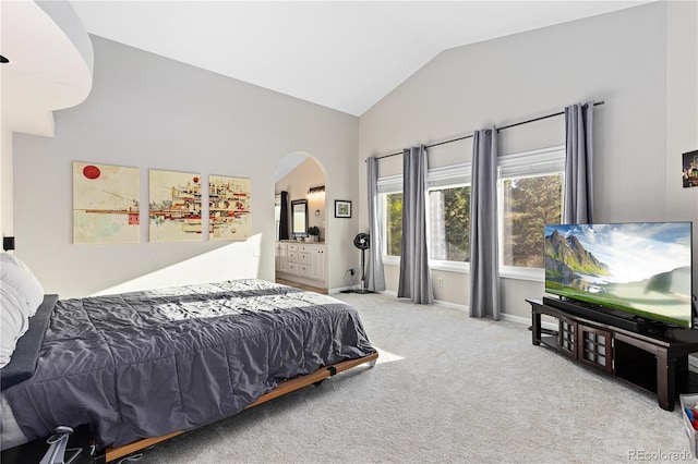 carpeted bedroom featuring vaulted ceiling