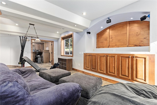 living room featuring beamed ceiling