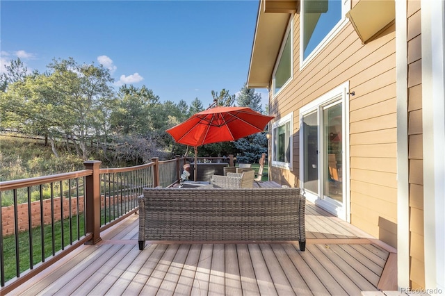 wooden deck with an outdoor hangout area