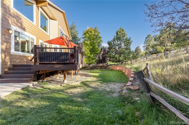 view of yard with a deck