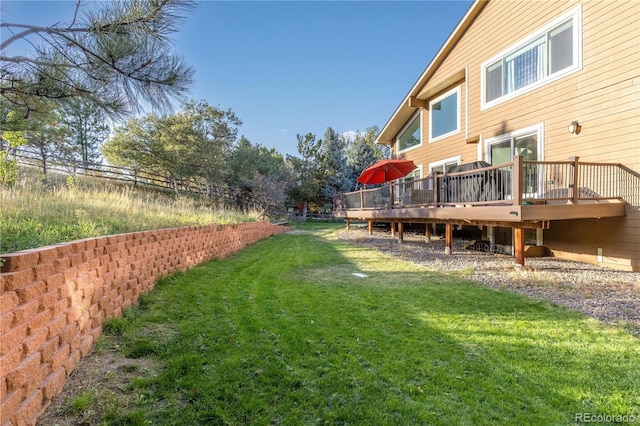 view of yard featuring a deck