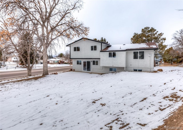 view of snow covered property