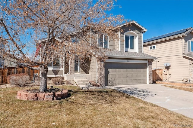 view of front of property with driveway, an attached garage, fence, and brick siding