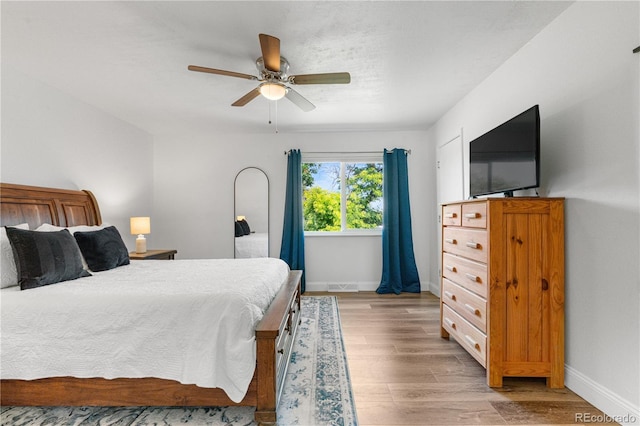 6604 S Dahlia Cir, Centennial, CO 80121 - bedroom featuring wood finished floors and ceiling fan