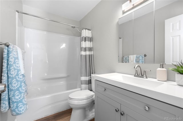 6604 S Dahlia Cir, Centennial, CO 80121 - full bath featuring vanity, shower / tub combo, and wood finished floors