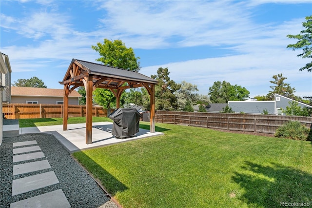 6604 S Dahlia Cir, Centennial, CO 80121 - fenced backyard with a gazebo and a patio area