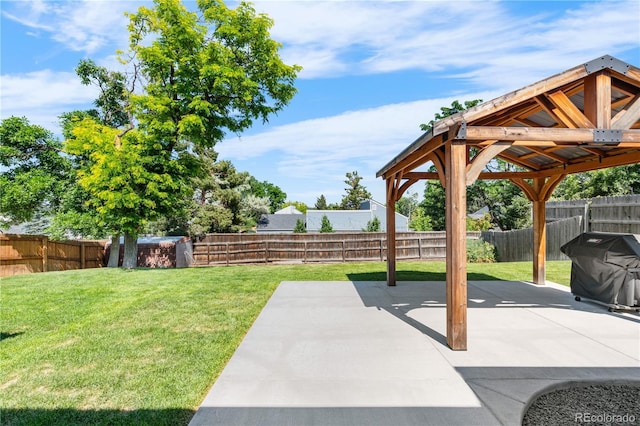 6604 S Dahlia Cir, Centennial, CO 80121 - fenced backyard featuring a patio