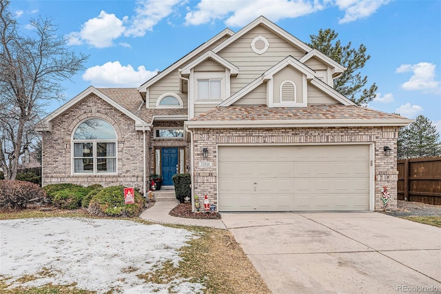 view of front of property with a garage