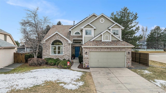 view of front of property with a garage