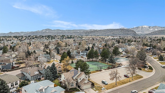 birds eye view of property featuring a mountain view