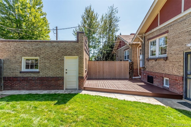 view of yard featuring a wooden deck