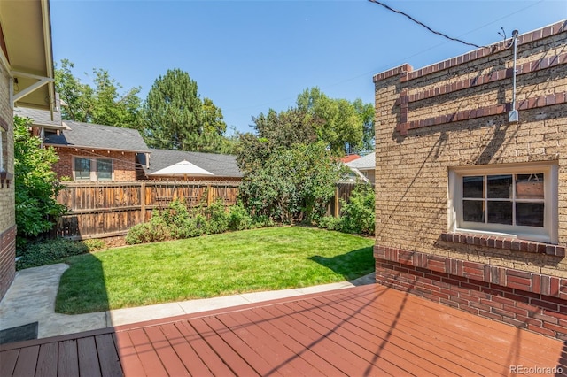 deck featuring a yard