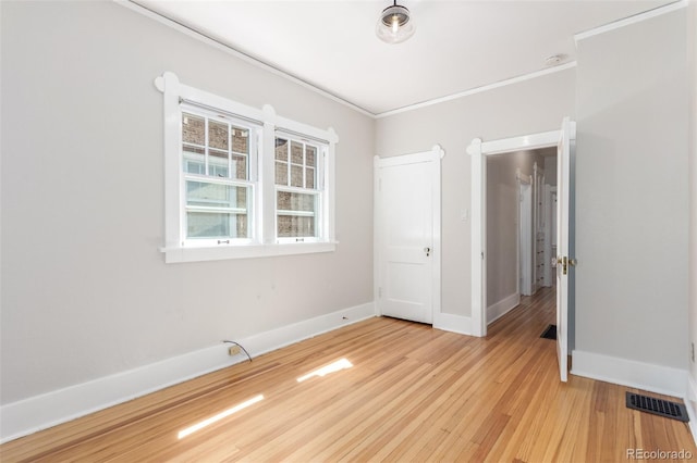 unfurnished bedroom with light hardwood / wood-style floors