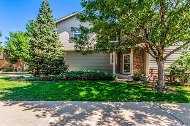 6190 S Oswego St, Englewood, CO 80111 - obstructed view of property with a front lawn