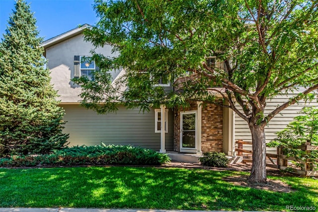 6190 S Oswego St, Englewood, CO 80111 - view of property hidden behind natural elements with a front lawn