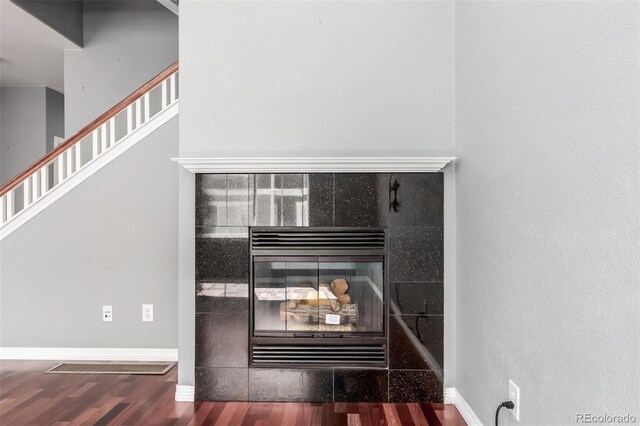 6190 S Oswego St, Englewood, CO 80111 - detailed view of wood finished floors and a fireplace