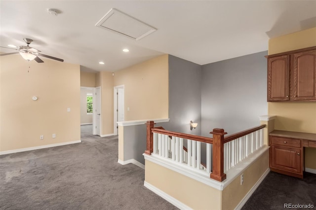 6190 S Oswego St, Englewood, CO 80111 - corridor with an upstairs landing, dark colored carpet, recessed lighting, and attic access