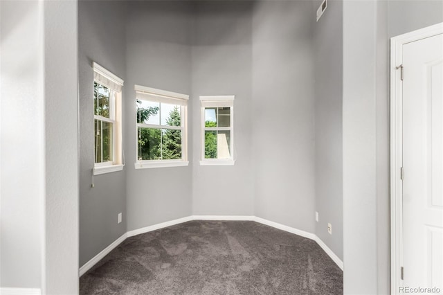 6190 S Oswego St, Englewood, CO 80111 - carpeted empty room featuring baseboards