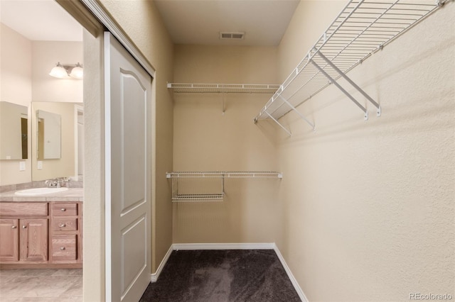 6190 S Oswego St, Englewood, CO 80111 - spacious closet with a sink