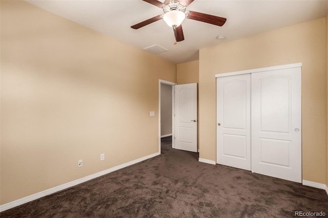 6190 S Oswego St, Englewood, CO 80111 - unfurnished bedroom featuring dark colored carpet, a closet, and a ceiling fan
