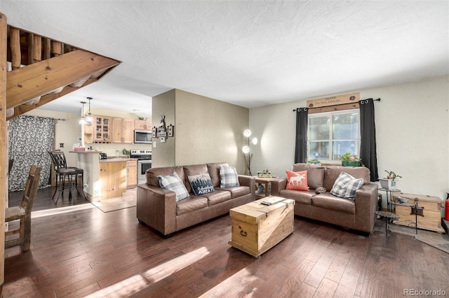 living room featuring dark hardwood / wood-style floors