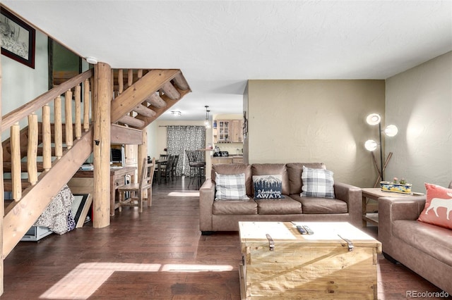 living room featuring dark wood-type flooring