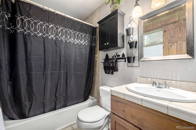 full bathroom featuring toilet, shower / bathtub combination with curtain, and vanity