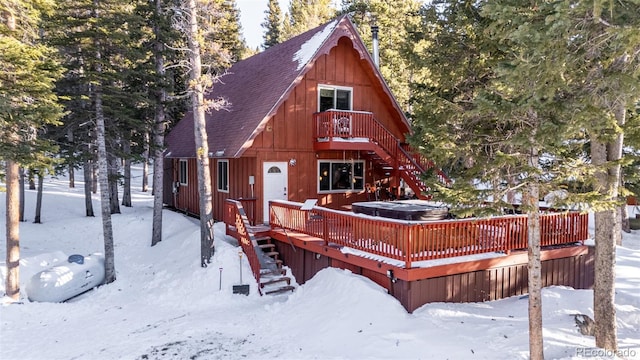 view of front of home with a wooden deck