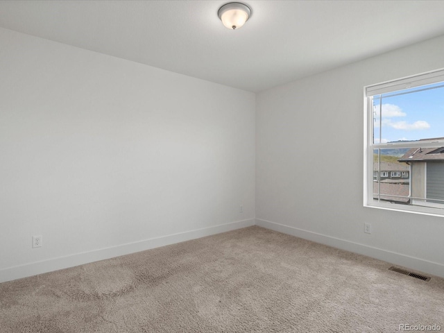 17843 W 93rd Pl, Arvada, CO 80007 - spare room featuring carpet and baseboards