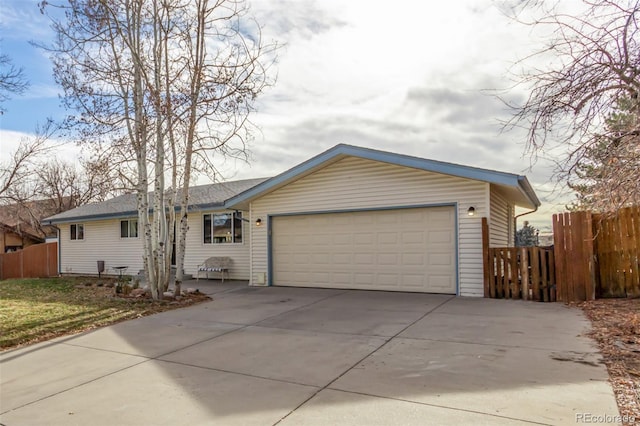 ranch-style house featuring a garage