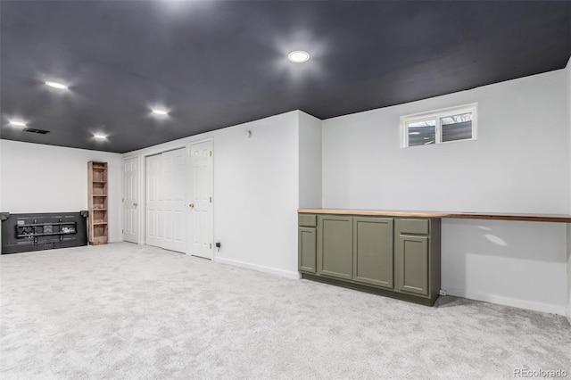 basement with light carpet