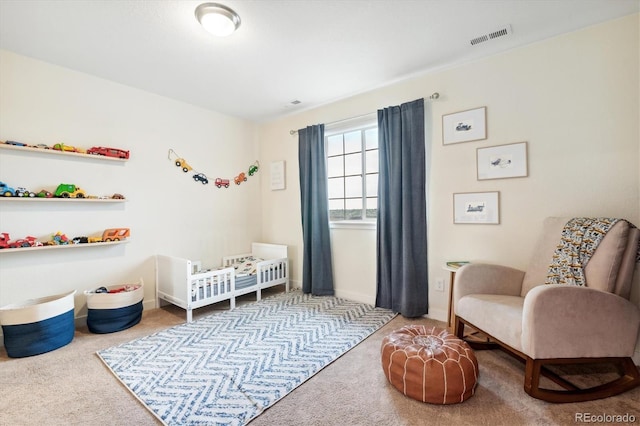 bedroom with light carpet